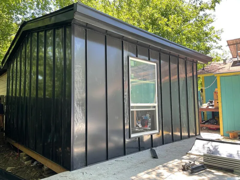 Black standing seam metal wall panels for Roof Inspection in LaSalle