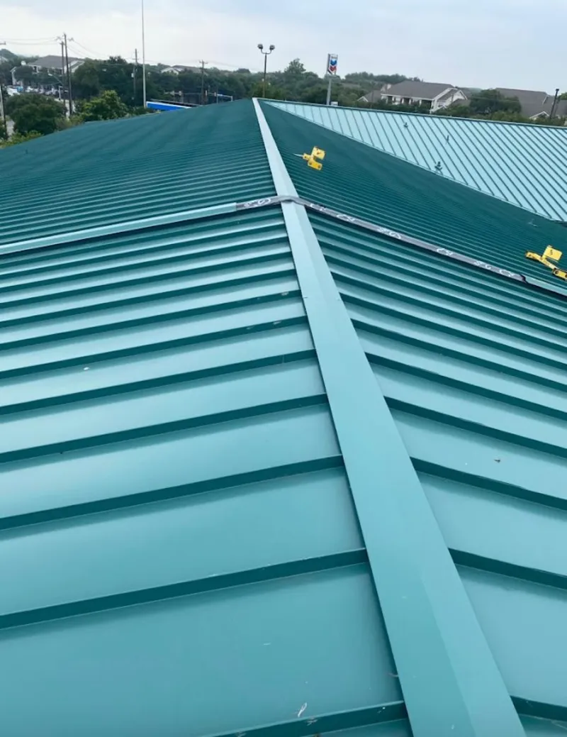 Green commercial metal roof ridge and valley for Metal Roof Repair in LaSalle