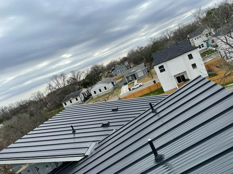 Standing seam metal roof panels with vents for Skylight Repair in LaSalle